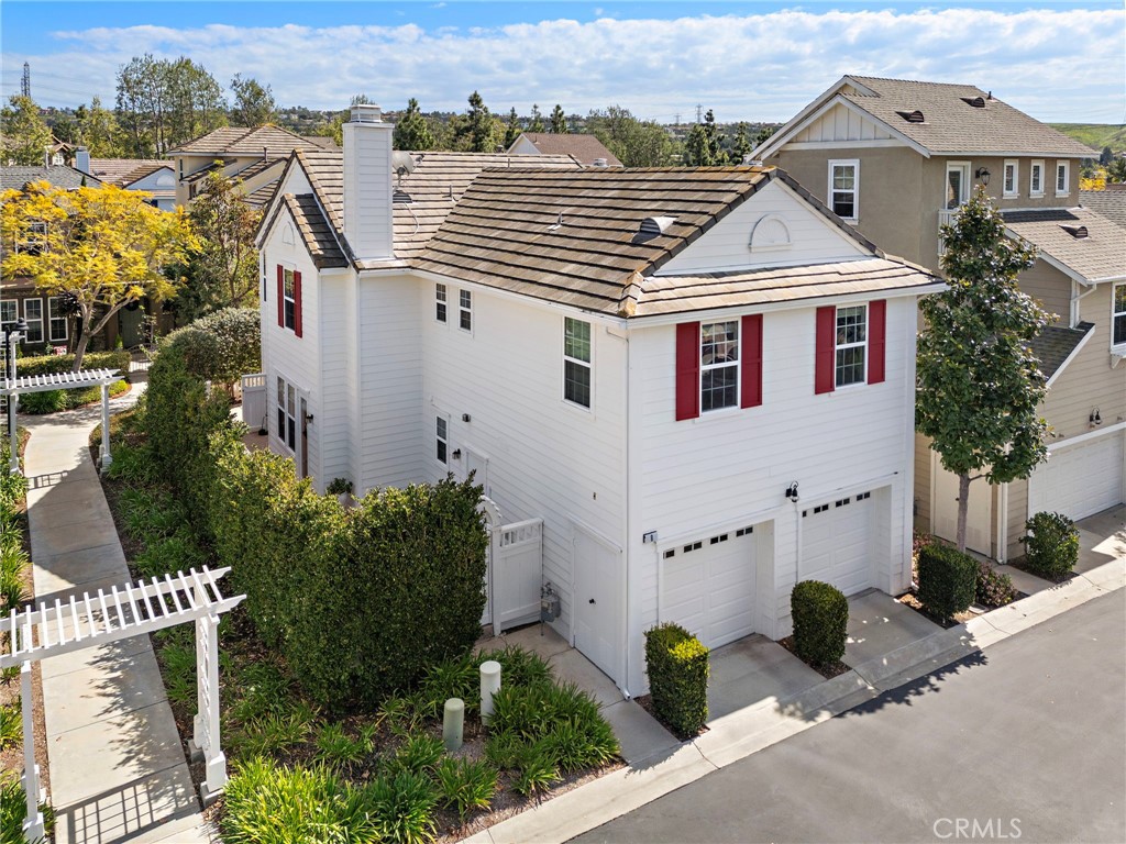 8 Earthen Court Ladera Ranch, CA 92694 - Photo 4 of 58 an aerial view of a house with a yard