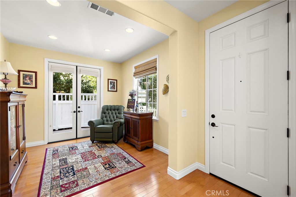 8 Earthen Court Ladera Ranch, CA 92694 - Photo 6 of 58 a living room with furniture and a rug