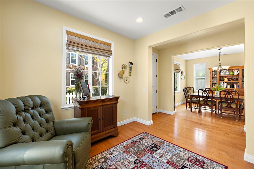 8 Earthen Court Ladera Ranch, CA 92694 - Photo 7 of 58 a living room with furniture and a wooden floor