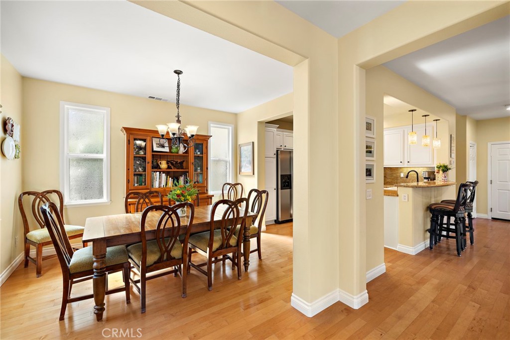 8 Earthen Court Ladera Ranch, CA 92694 - Photo 8 of 58 a view of a dining room with furniture window and wooden floor