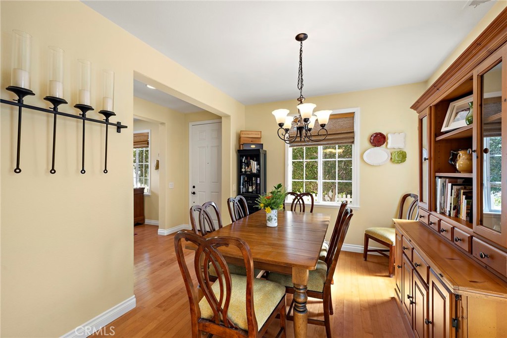 8 Earthen Court Ladera Ranch, CA 92694 - Photo 9 of 58 a view of a dining room with furniture window and wooden floor