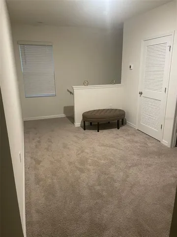 a bedroom with a bed and a cabinets
