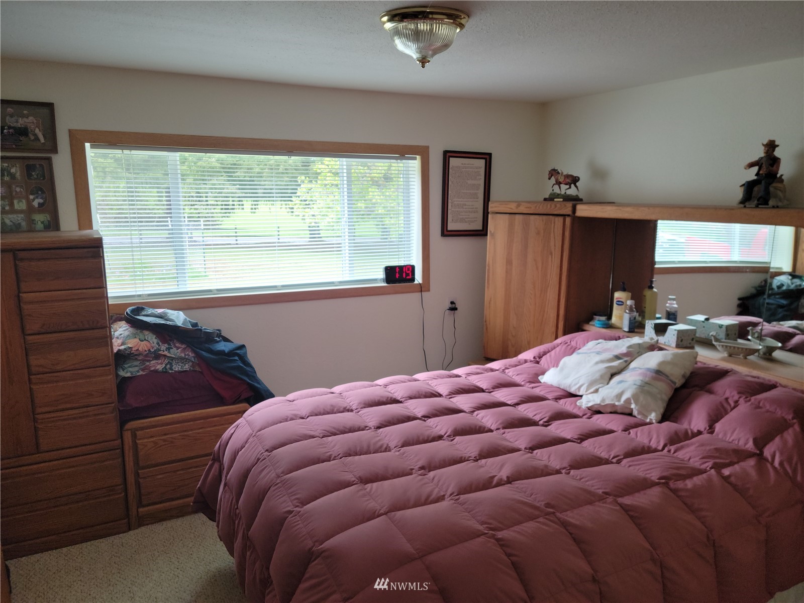231 Monroe Road Winlock, WA 98596 - Photo 13 of 24 a bedroom with a bed and window