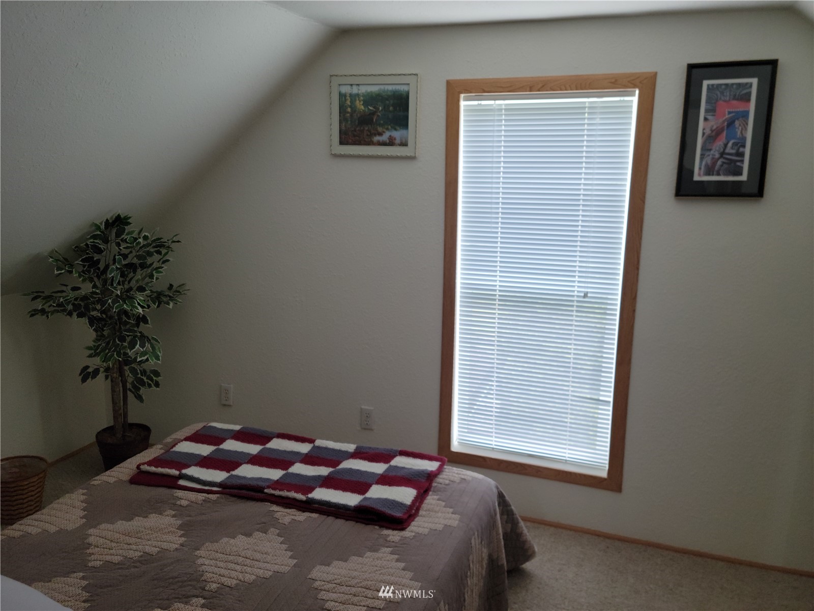 231 Monroe Road Winlock, WA 98596 - Photo 14 of 24 a bedroom with a bed and a window