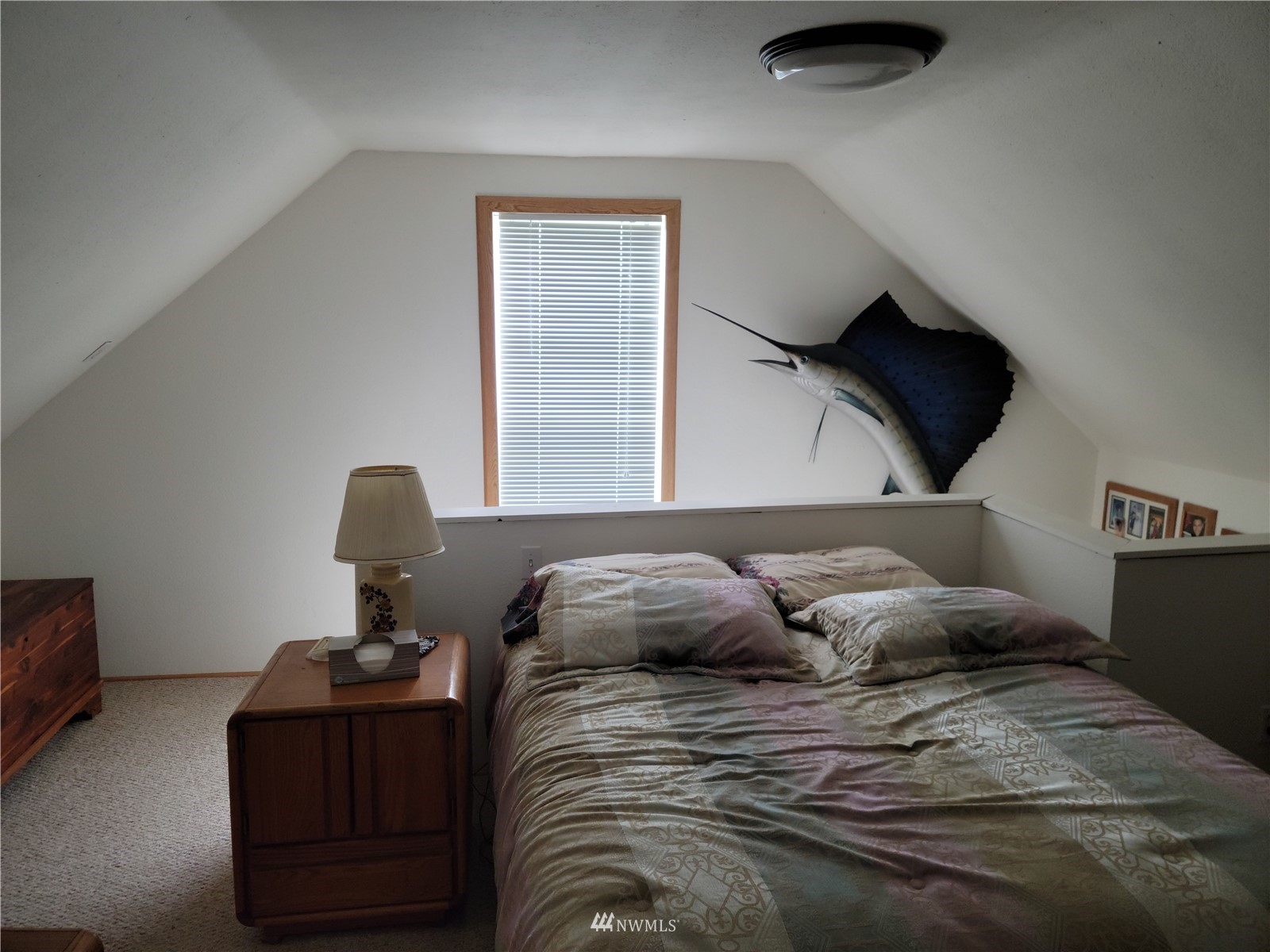 231 Monroe Road Winlock, WA 98596 - Photo 15 of 24 a bedroom with a bed and window