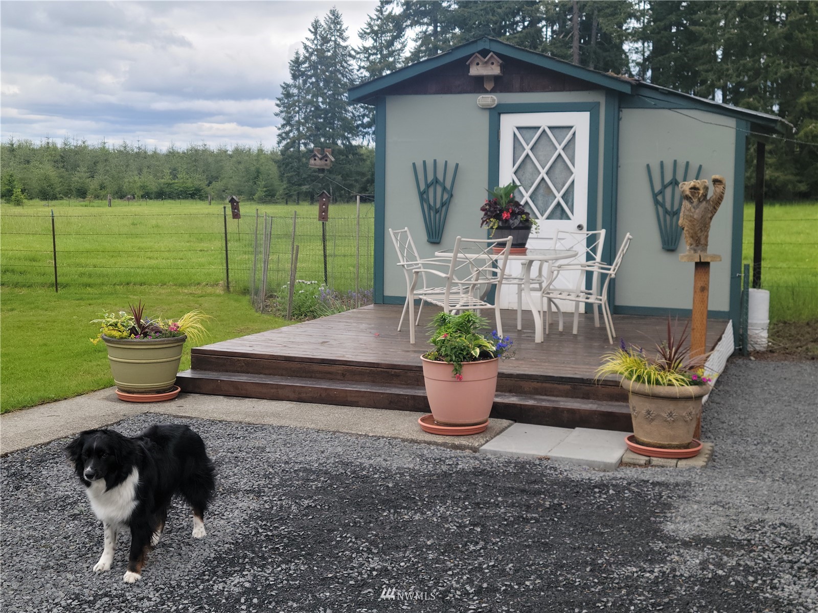 231 Monroe Road Winlock, WA 98596 - Photo 19 of 24 a view of a house with backyard and sitting area