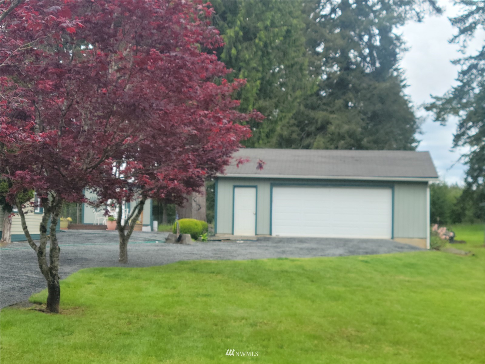 231 Monroe Road Winlock, WA 98596 - Photo 3 of 24 a house view with a garden space