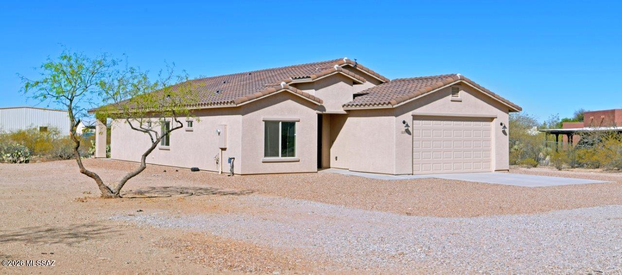 1091 North Vail View Road Vail, AZ 85641 - Photo 43 of 43 a house with a outdoor space