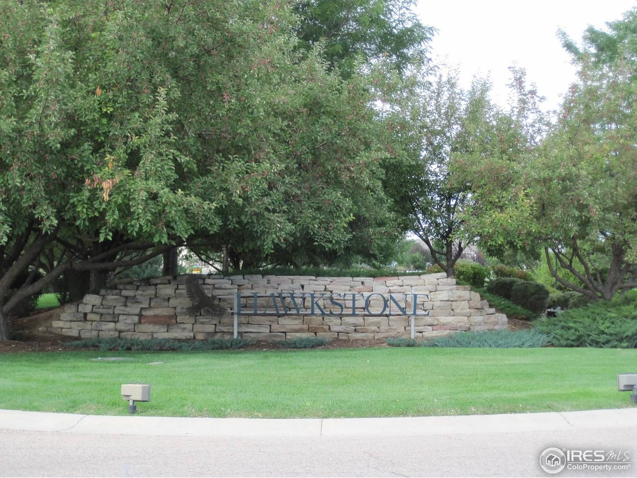 1550 Prairie Hawk Road Eaton, CO 80615 - Photo 1 of 12 Hawkstone Entrance