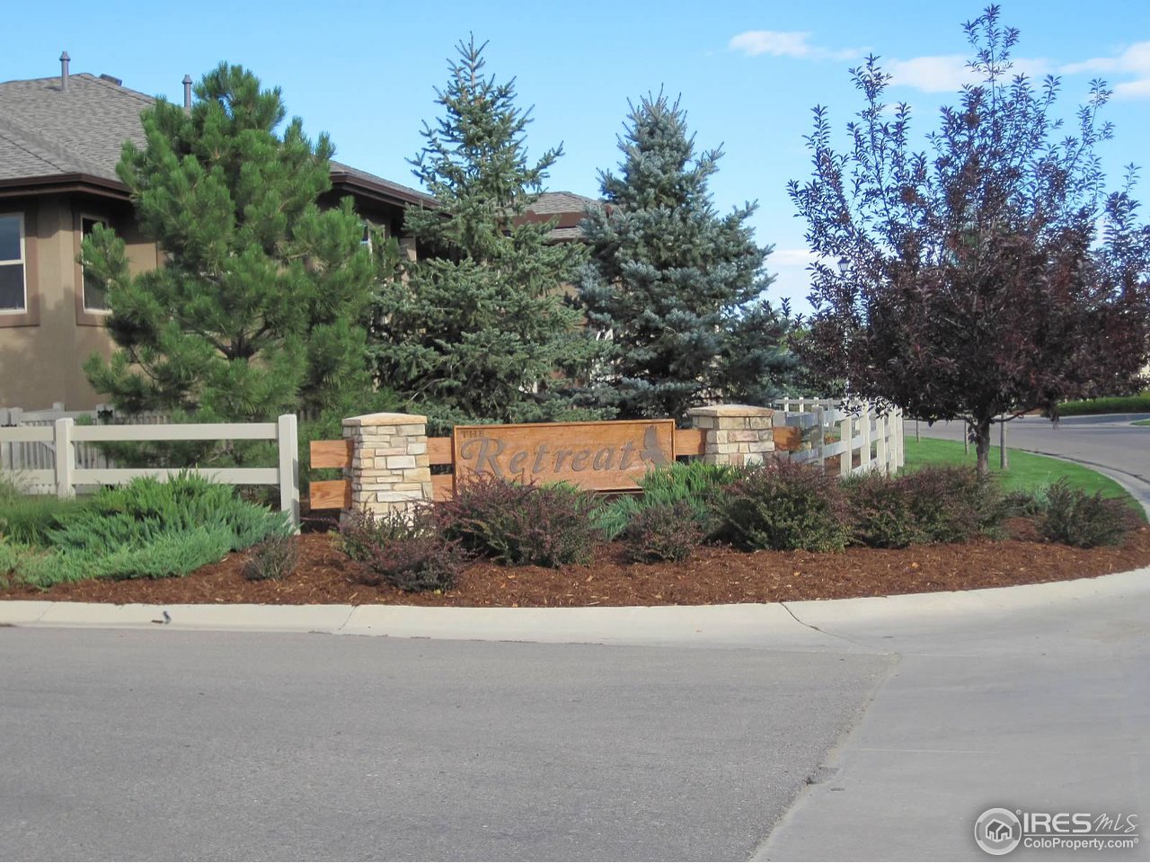 1550 Prairie Hawk Road Eaton, CO 80615 - Photo 2 of 12 Retreat Patio Homes Entrance