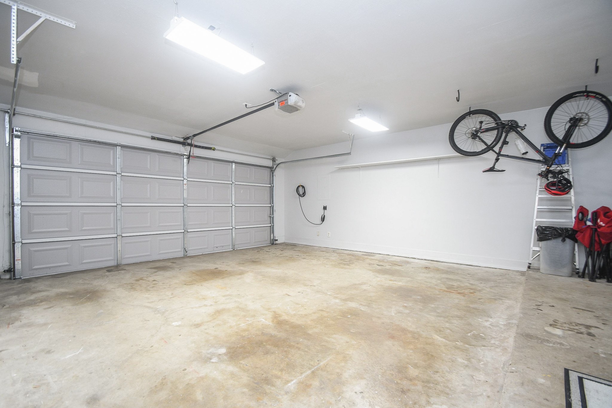 239 Malone Street, Unit B Houston, TX 77007 - Photo 34 of 35 Garage has EV charger and storage hooks for bikes