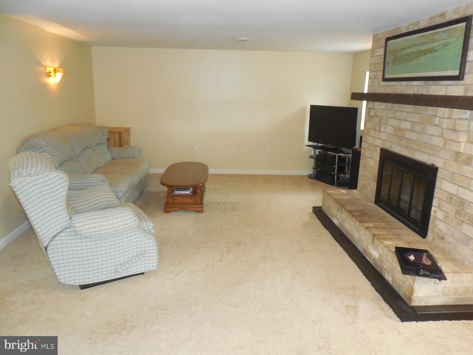 1150 Ruth Street York, PA 17408 - Photo 3 of 34 MAIN FLOOR - LR - FIREPLACE, 3 SEASON ROOM ACCESS