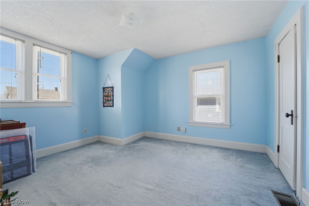 4422 State Road Ashtabula, OH 44004 - Photo 17 of 21 Additional living space featuring light colored carpet and baseboards