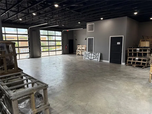 a furnished livingroom with a window