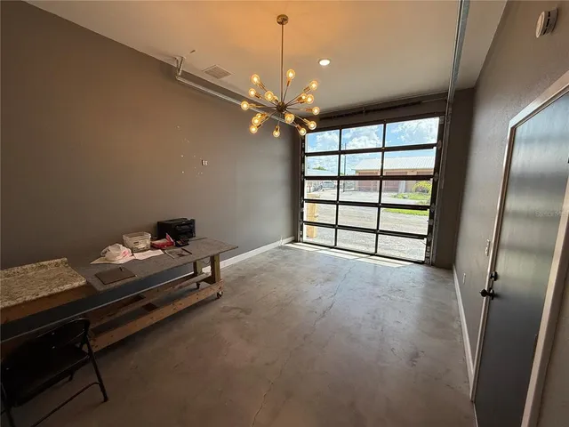 a view of a room with a chandelier