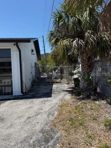 a view of outdoor space with deck and barbeque oven