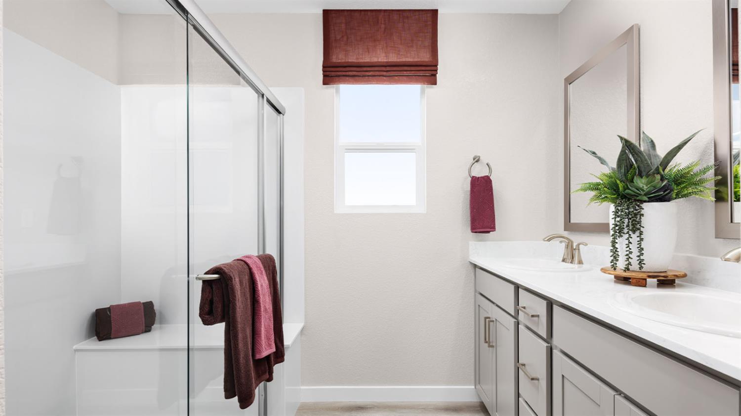 2922 Porcelain Street Lincoln, CA 95648 - Photo 7 of 14 a bathroom with a sink a mirror and potted plant