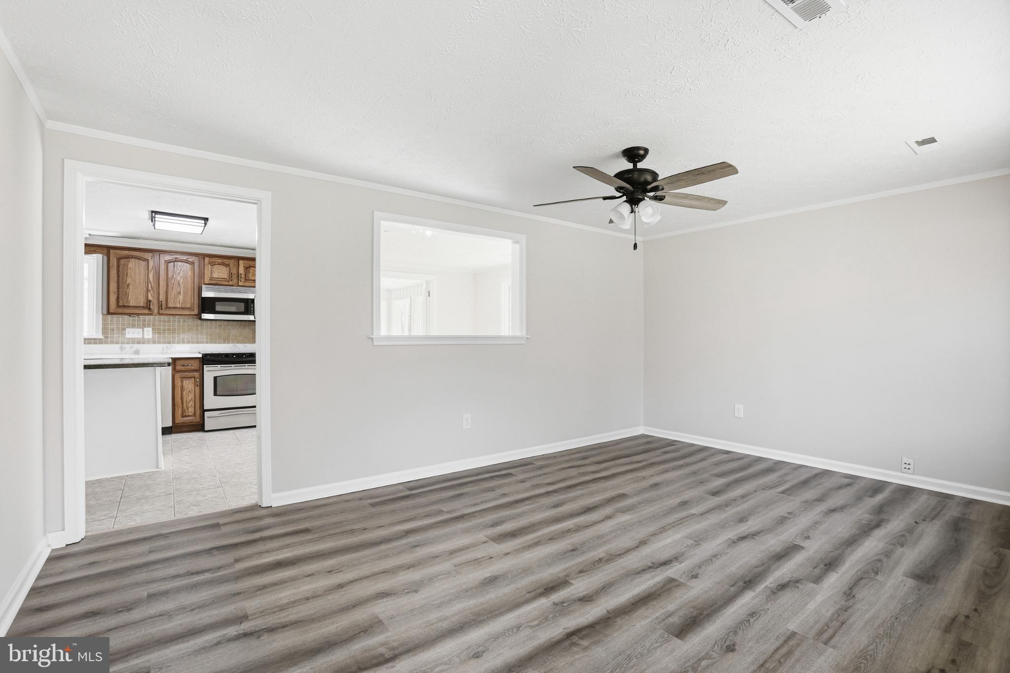7012 Stanley Road King George, VA 22485 - Photo 5 of 37 Bright and airy living space awaits.