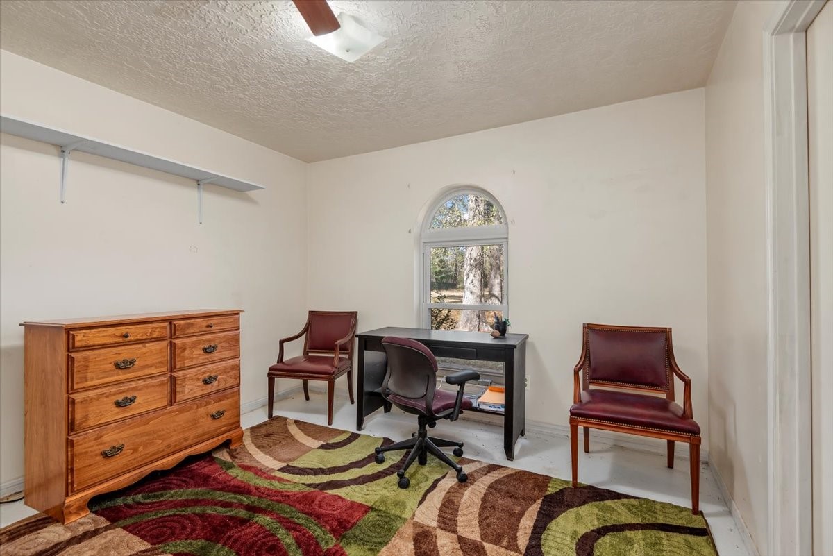 504 Catfish Lane Conroe, TX 77384 - Photo 21 of 48 a workspace with furniture and window