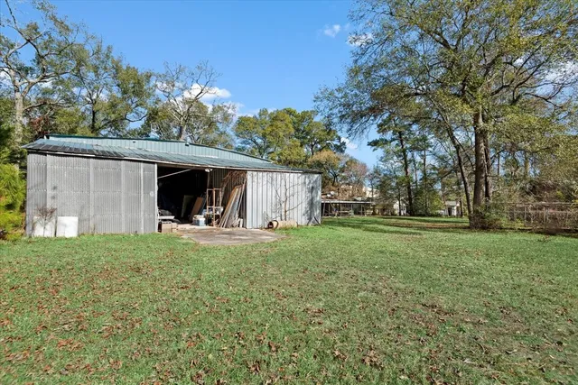 a view of outdoor space with trees all around