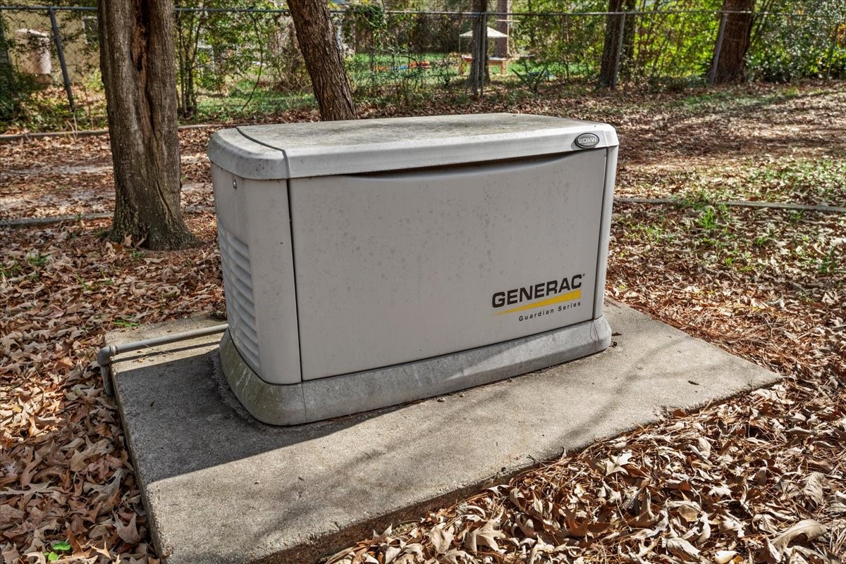 504 Catfish Lane Conroe, TX 77384 - Photo 37 of 48 a view of a pathway with a tree in the background