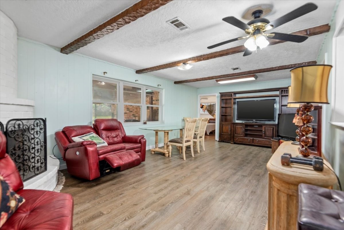 504 Catfish Lane Conroe, TX 77384 - Photo 8 of 48 a living room with furniture and a flat screen tv