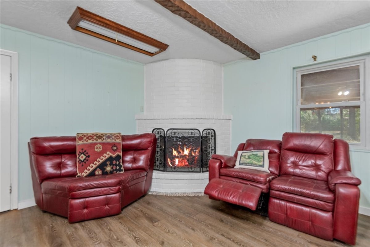 504 Catfish Lane Conroe, TX 77384 - Photo 9 of 48 a living room with furniture a fireplace