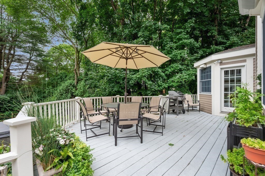 758 South Street Needham, MA 02492 - Photo 12 of 30 a view of balcony with furniture and umbrella