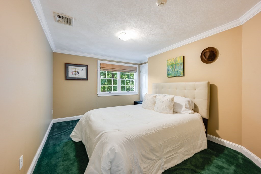 758 South Street Needham, MA 02492 - Photo 23 of 30 a bedroom with a bed and a window