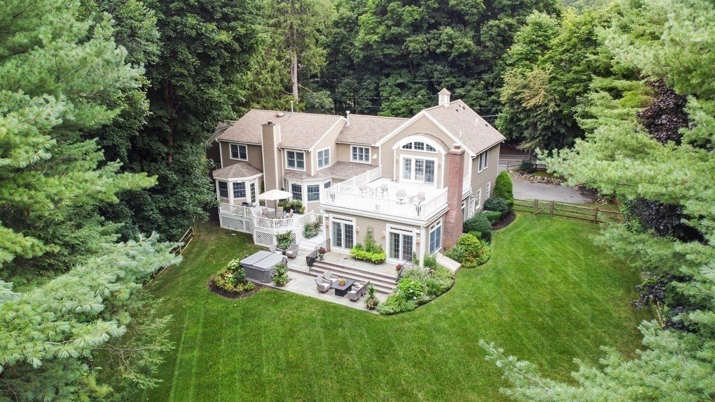 758 South Street Needham, MA 02492 - Photo 27 of 30 a aerial view of a house with a big yard and large trees