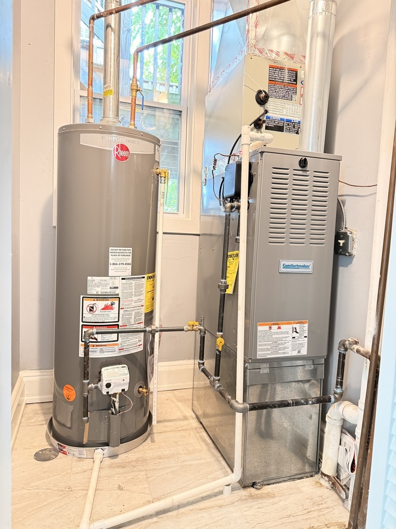 3821 West Fillmore Street, Unit 2R Chicago, IL 60624 - Photo 9 of 12 a bathroom with a sink and a mirror