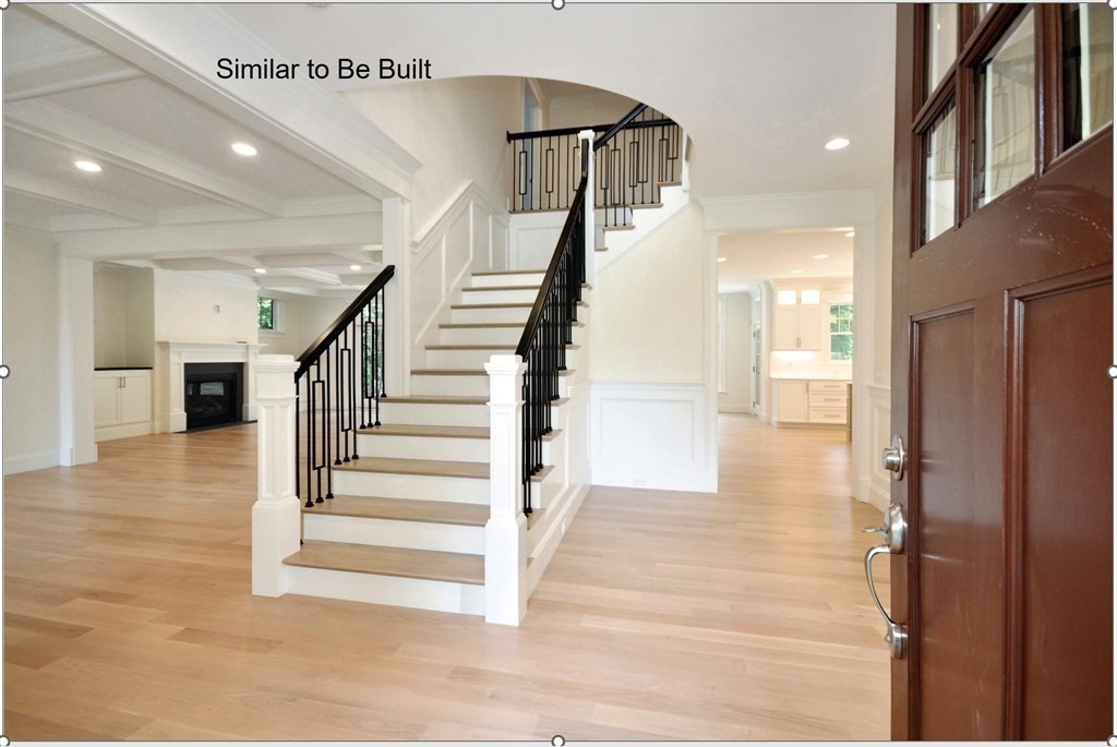 129 Shade Street Lexington, MA 02421 - Photo 2 of 6 a view of entryway and hall with wooden floor