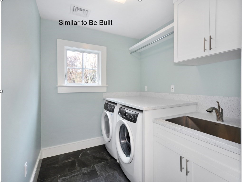 129 Shade Street Lexington, MA 02421 - Photo 5 of 6 a utility room with dryer and washer