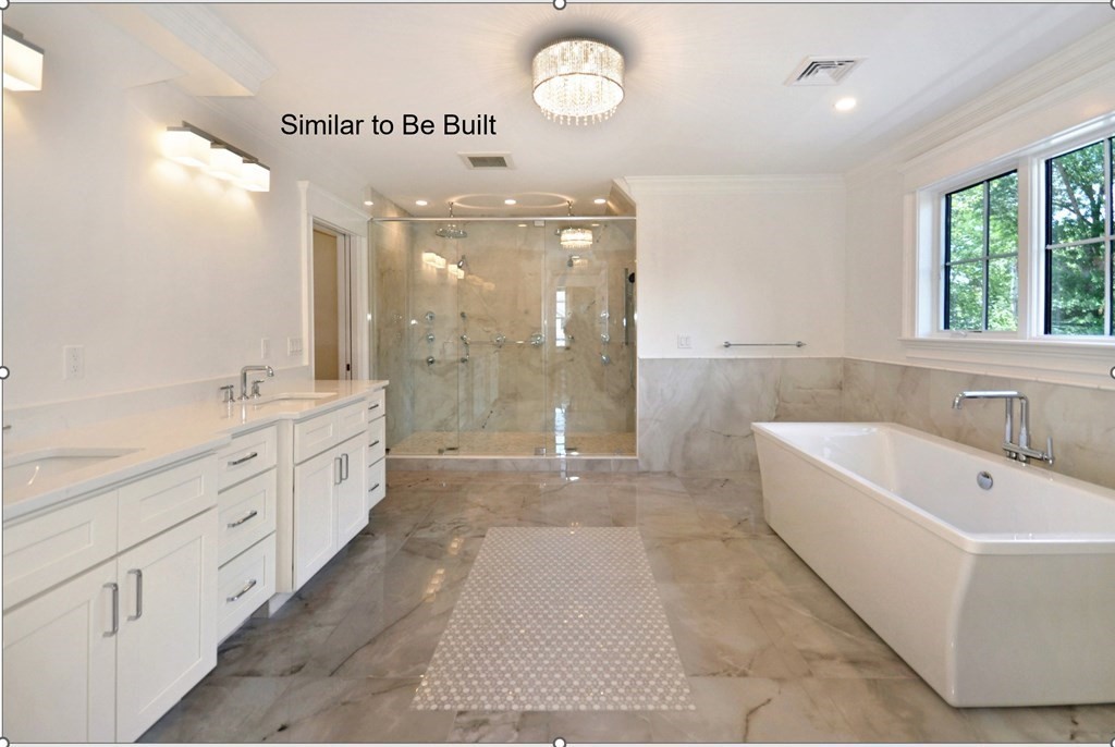 129 Shade Street Lexington, MA 02421 - Photo 6 of 6 a spacious bathroom with a tub sink shower and mirror