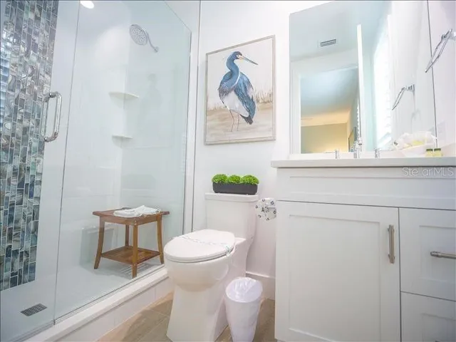 a bathroom with a toilet and a sink
