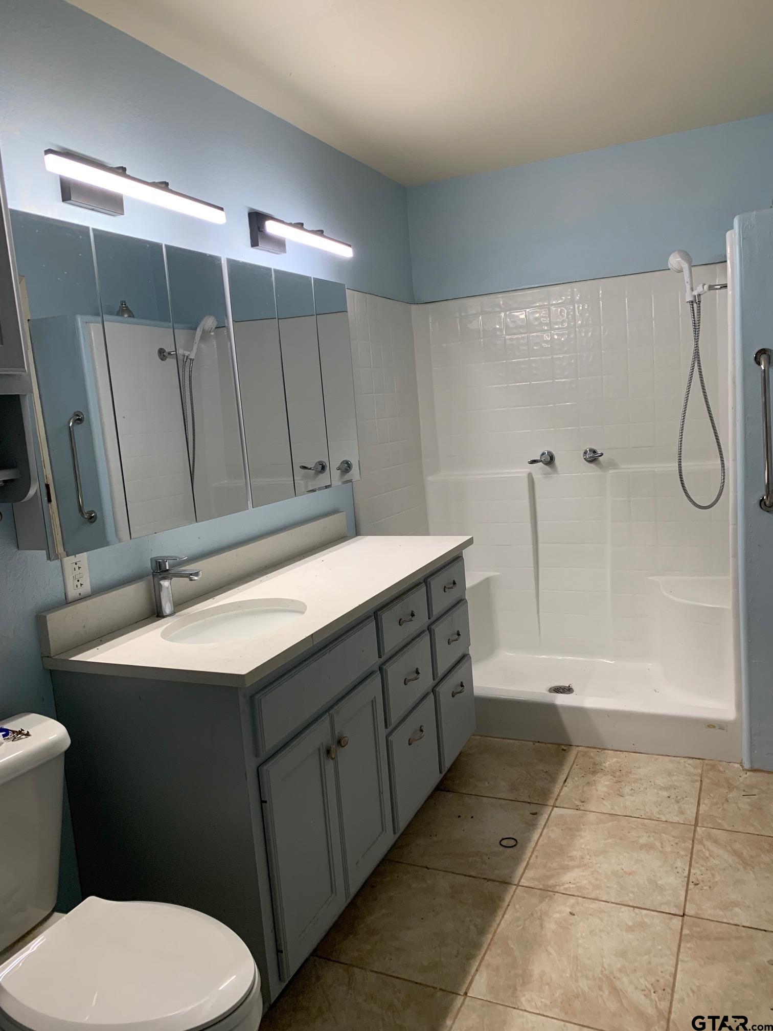 120 Rscr 3340 Emory, TX 75440 - Photo 1 of 21 a bathroom with a sink and mirror