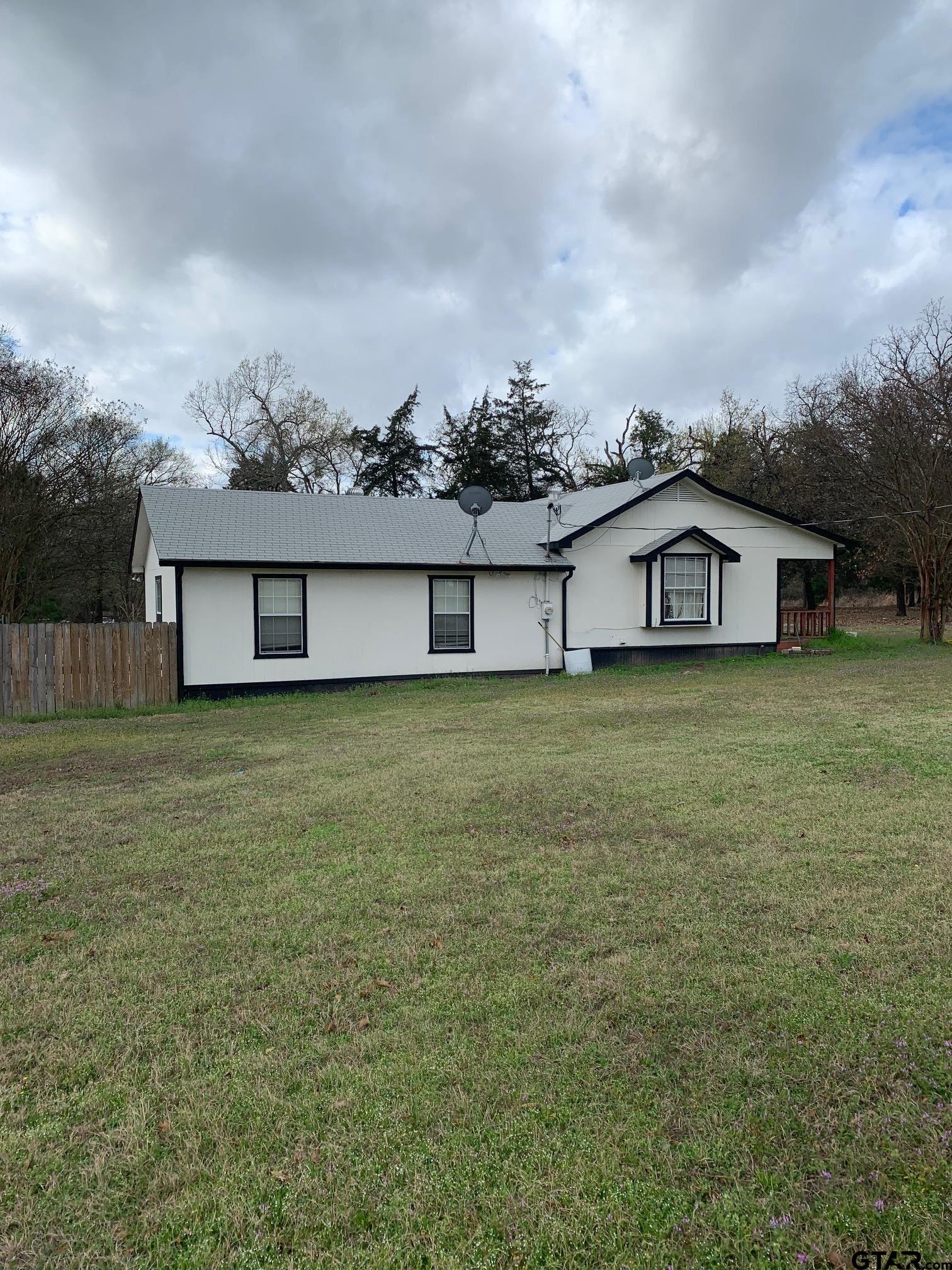 120 Rscr 3340 Emory, TX 75440 - Photo 11 of 21 a view of a house with a yard