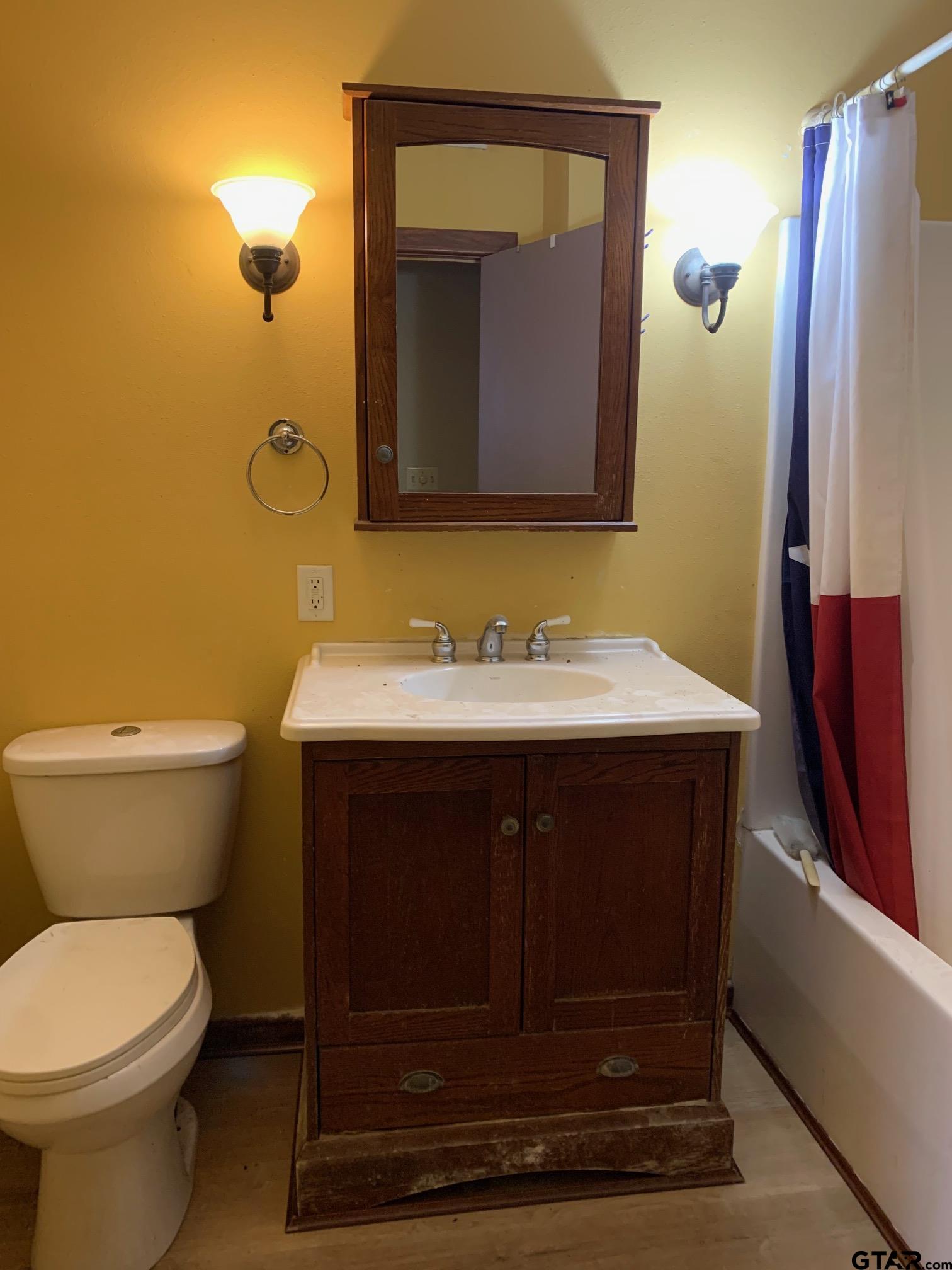 120 Rscr 3340 Emory, TX 75440 - Photo 3 of 21 a bathroom with a sink vanity and toilet