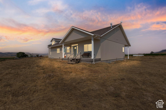 19502 South Olson Road Downey, ID 83234 - Photo 1 of 64 View of property exterior featuring a porch