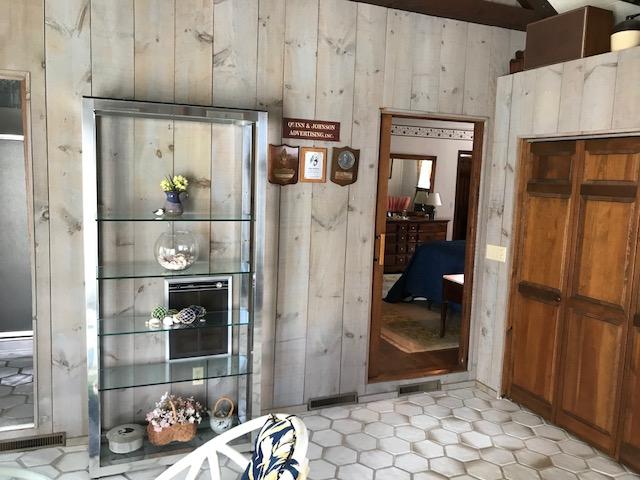 29 Schooner Road Dennis, MA 02638 - Photo 13 of 32 a view of a refrigerator and wooden floor in a room