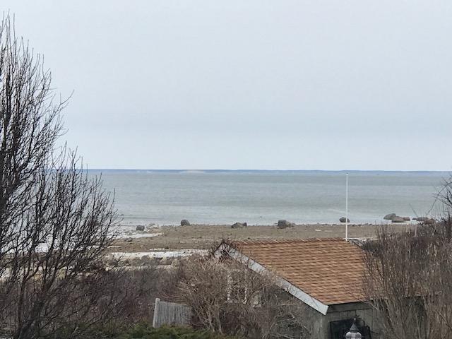 29 Schooner Road Dennis, MA 02638 - Photo 2 of 32 a view of a terrace with a lake view