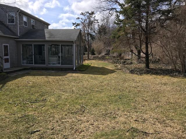 29 Schooner Road Dennis, MA 02638 - Photo 27 of 32 a view of a house with a yard
