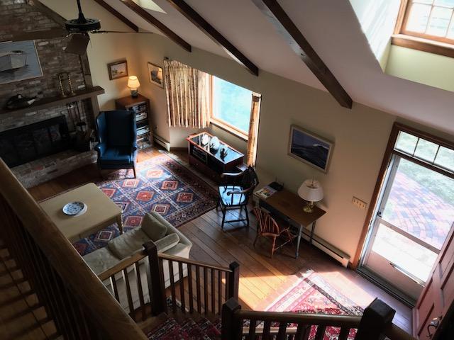 29 Schooner Road Dennis, MA 02638 - Photo 6 of 32 a living room with furniture and a flat screen tv