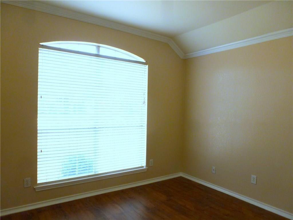 9911 Max Lane Frisco, TX 75035 - Photo 7 of 16 an empty room with a window