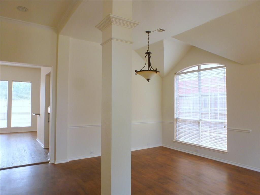 9911 Max Lane Frisco, TX 75035 - Photo 9 of 16 a view of empty room with wooden floor and fan