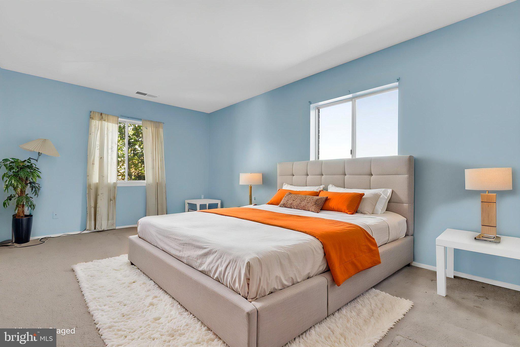 19309 Club House Road, Unit 19309 Gaithersburg, MD 20886 - Photo 17 of 24 a bedroom with a bed and window