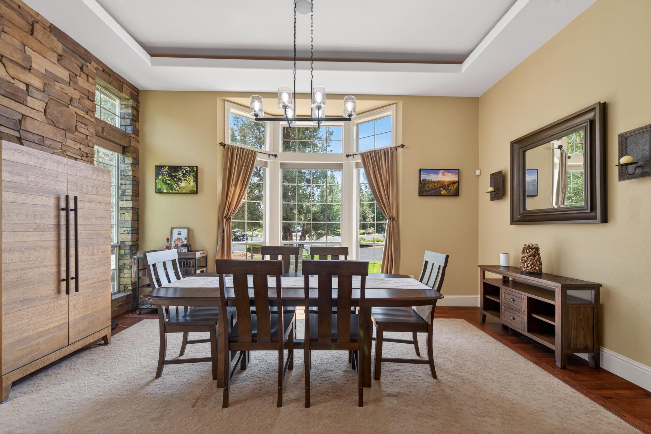 9009 Merlin Drive Redmond, OR 97756 - Photo 25 of 98 a view of a dining room with furniture window and outside view