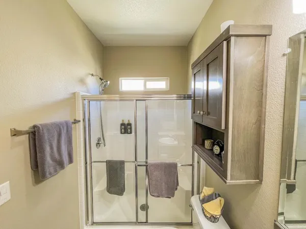 a bathroom with a sink and toilet
