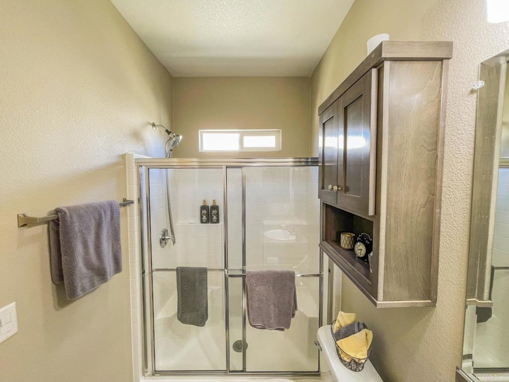 8545 Mission Gorge Road, Unit SPC 211 Santee, CA 92071 - Photo 11 of 33 a bathroom with a sink and toilet
