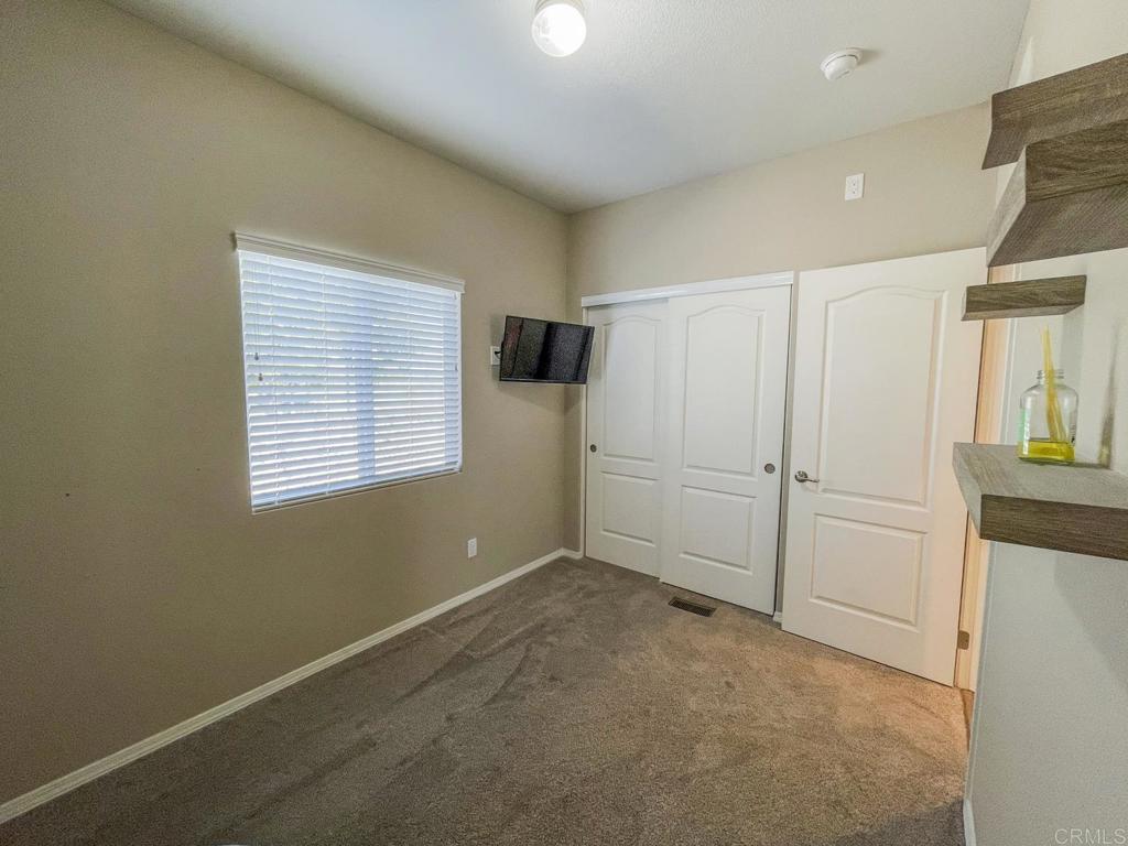 8545 Mission Gorge Road, Unit SPC 211 Santee, CA 92071 - Photo 12 of 33 a view of an empty room with a window